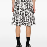 Shorts con stampa Fantasia in nero e bianco Comme des garcons black - unisex 