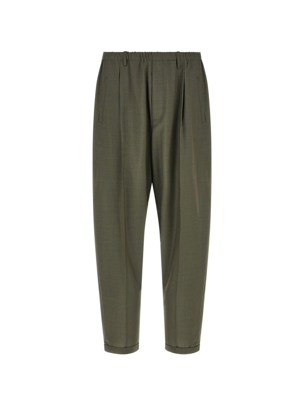 Pantaloni affusolati con elastico in vita in verde Magliano - uomo 