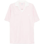 Polo con logo e ricamo a v in bianco Courrèges - donna 