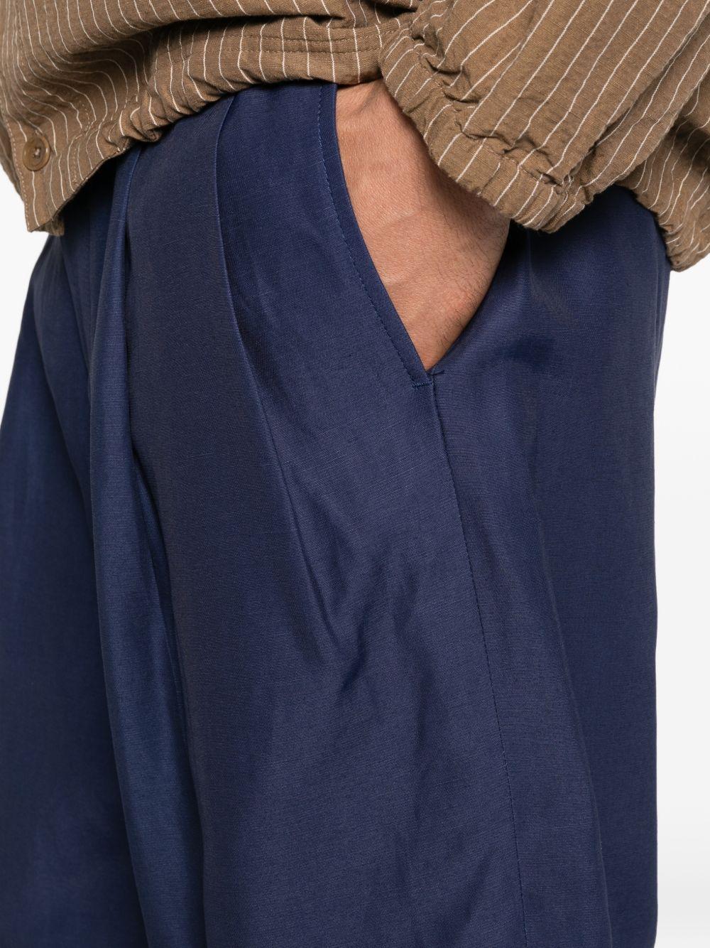 Pantaloncini a pieghe in blu Laneus - uomo 