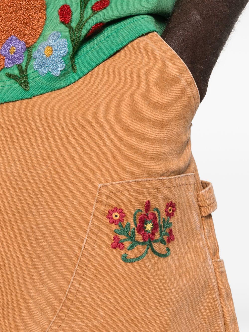 Pantaloncini ricamati con motivi floreali in marrone Found - uomo 