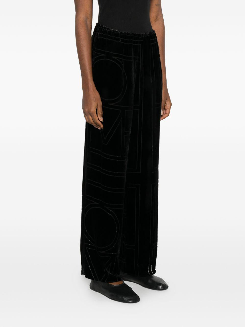 Pantaloni da pigiama monogram devoré in nero Toteme - donna 
