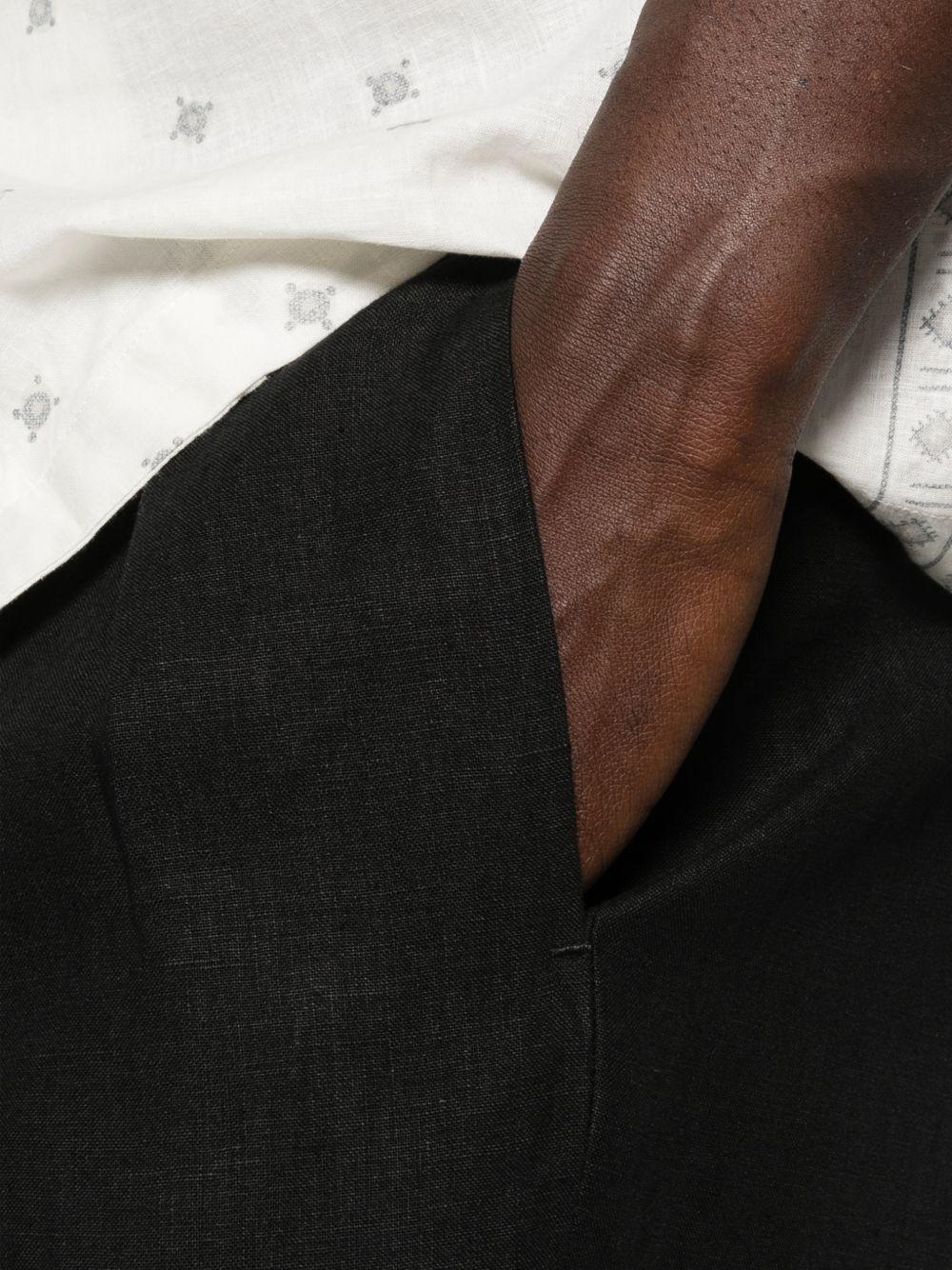 Pantaloni plissé  in nero Caruso - uomo 