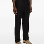 Pantaloni plissé  in nero Caruso - uomo 