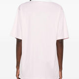Polo con logo e ricamo a v in bianco Courrèges - donna 