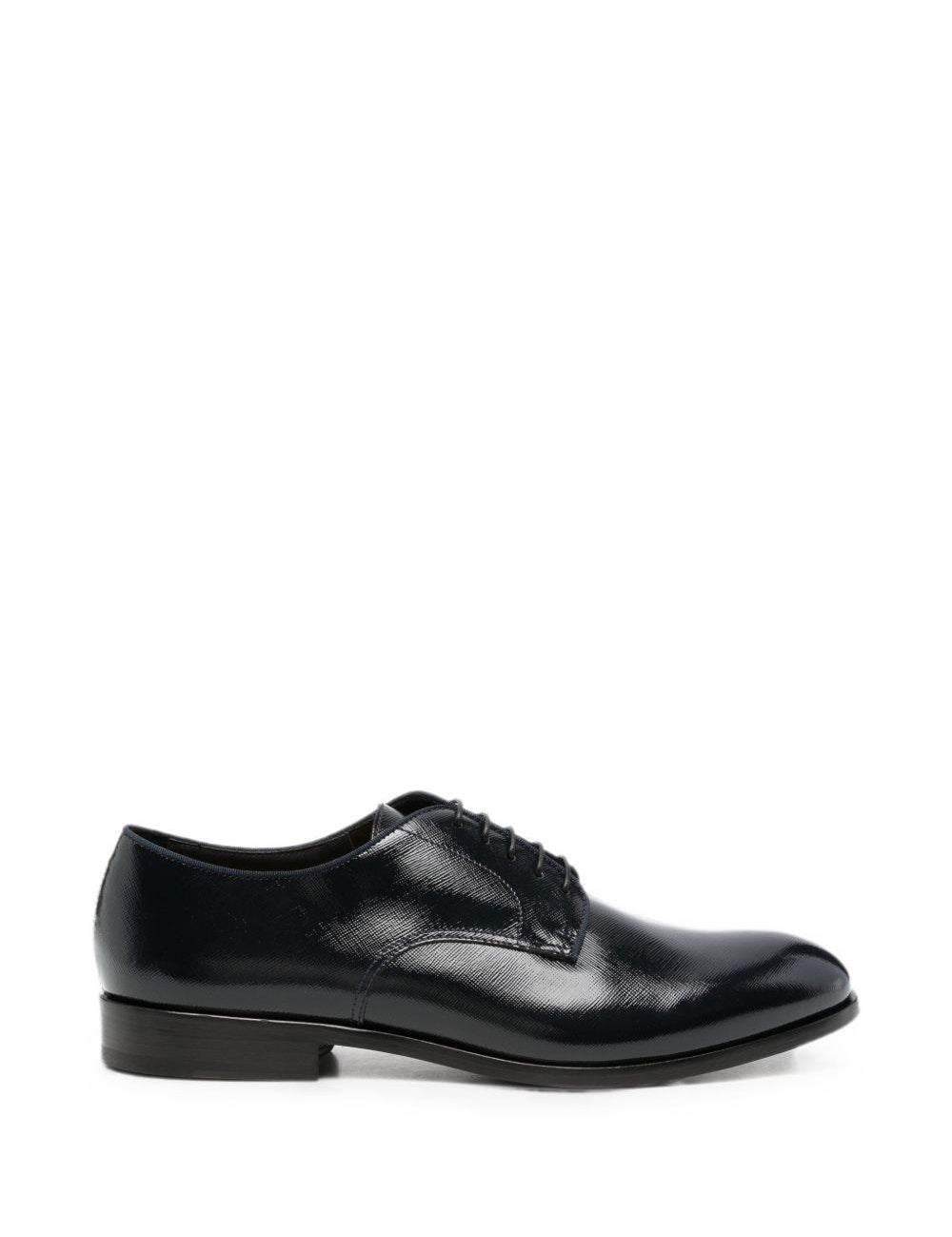 Derby in pelle in nero 