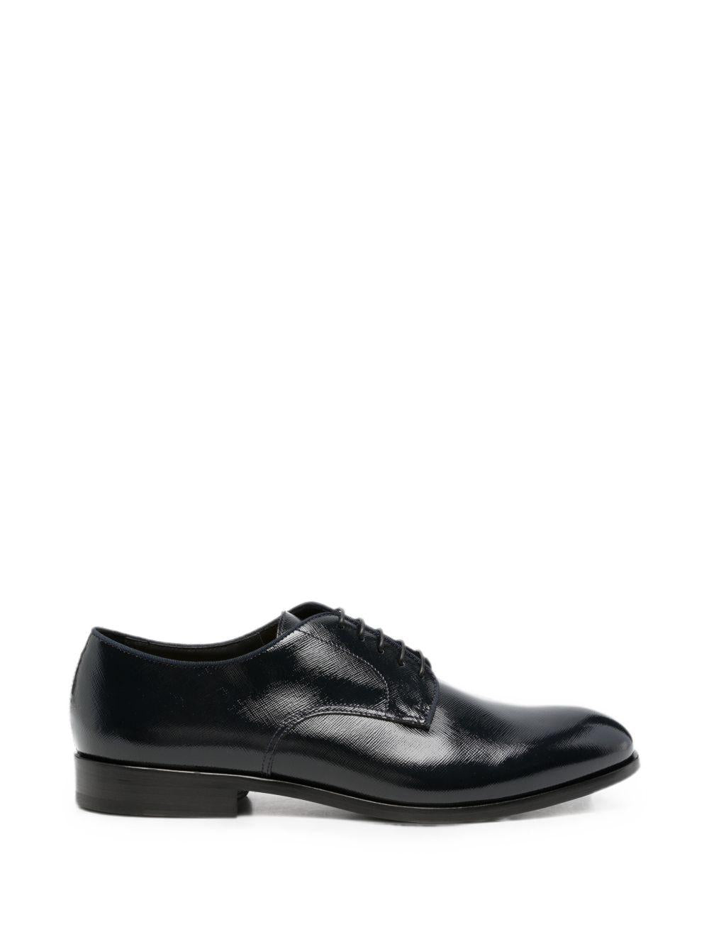 Derby in pelle in nero 