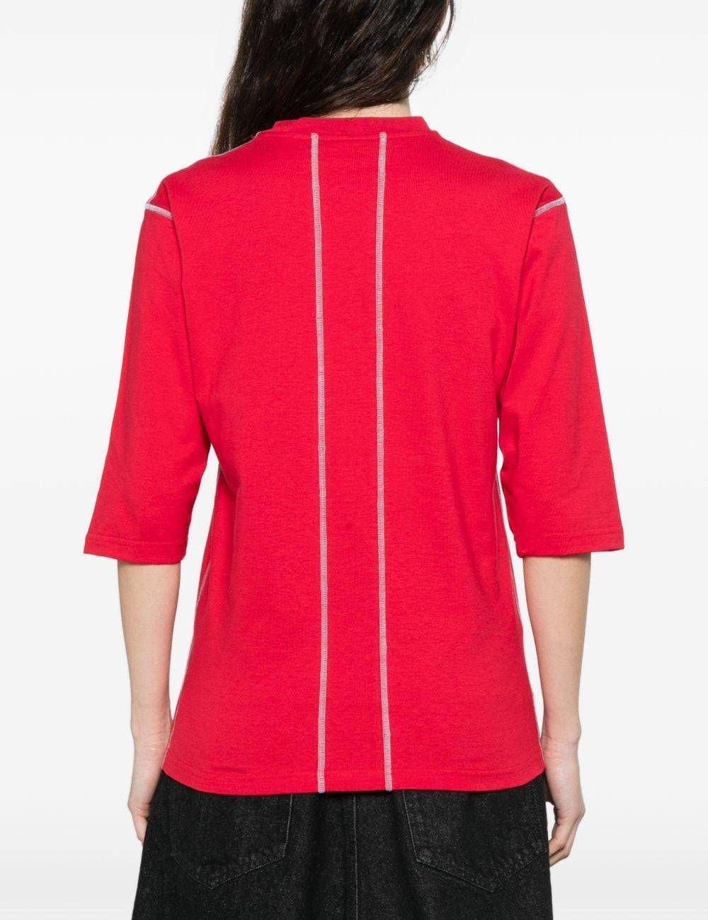 T-shirt a manica corta con impunture in rosso Gr10k - donna 