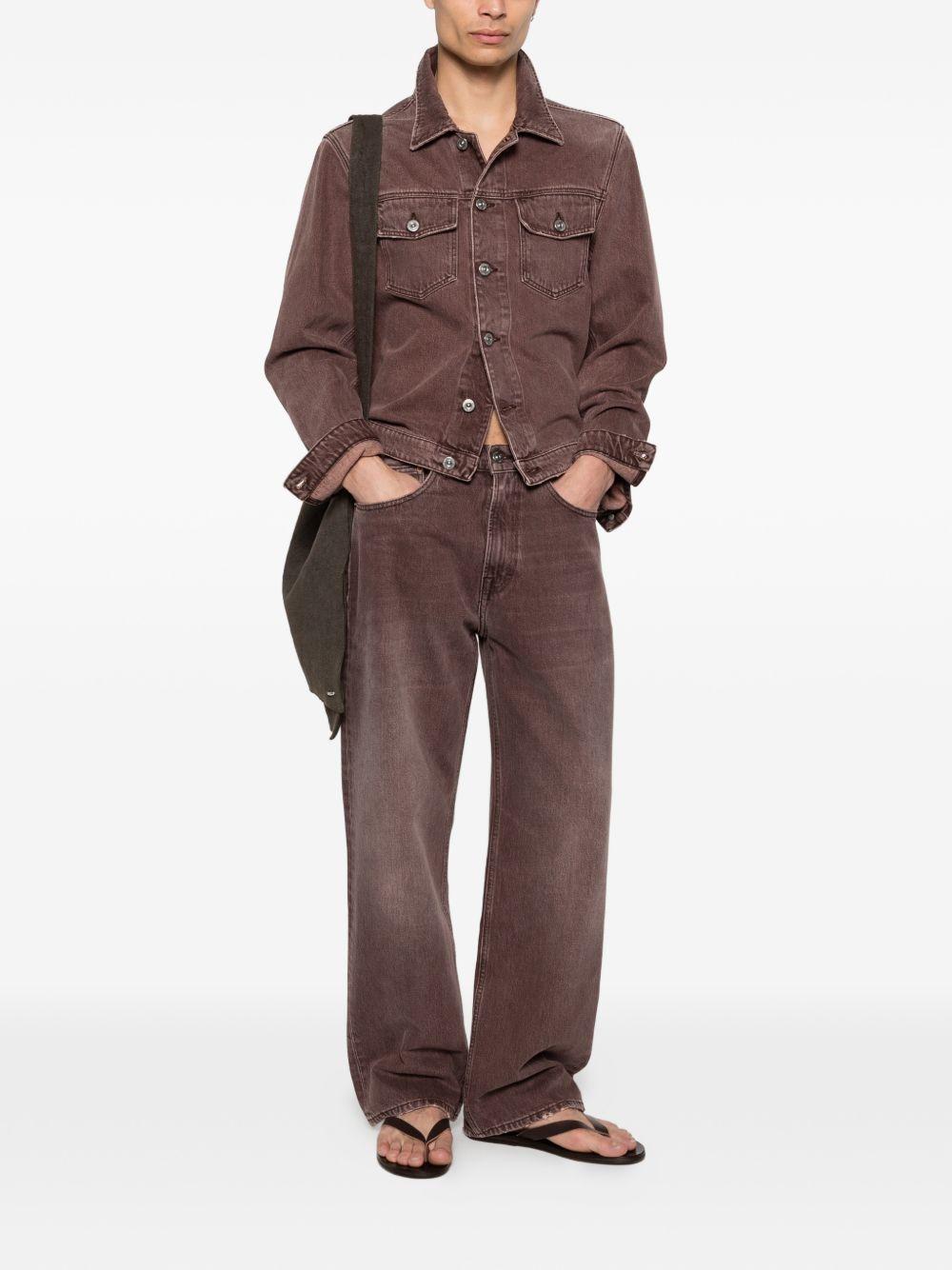 Jeans con effetto schiarito in marrone Our legacy - uomo 