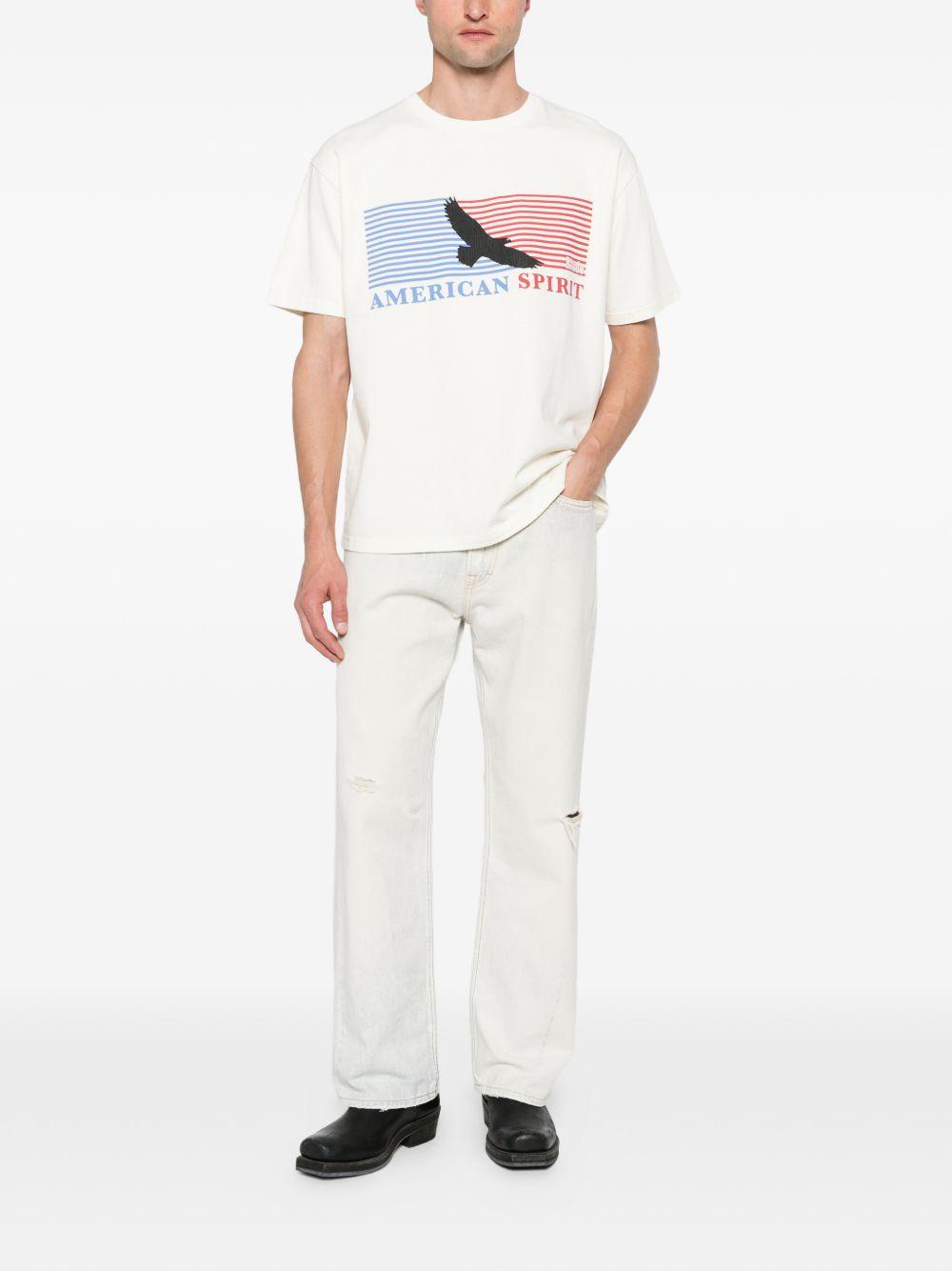 T-shirt con stampa grafica in bianco Rhude  - uomo 