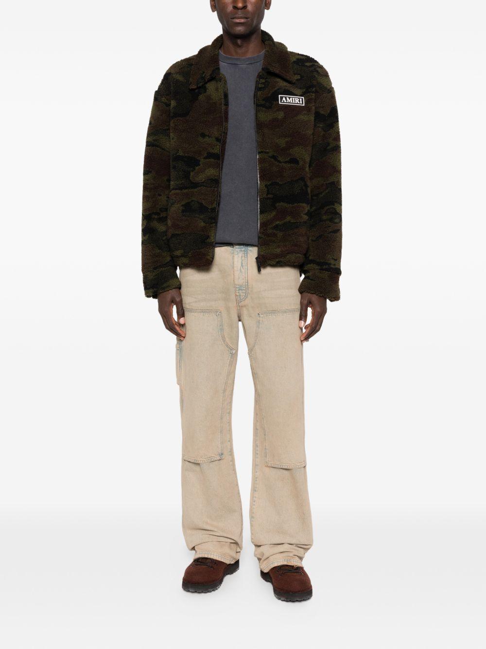 Jeans con tasche in beige Amiri - uomo 