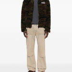 Jeans con tasche in beige Amiri - uomo 