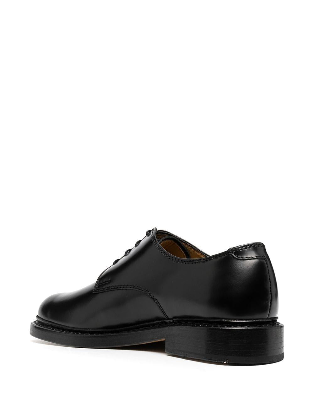 Derby uniform parade in nero Our legacy - uomo 
