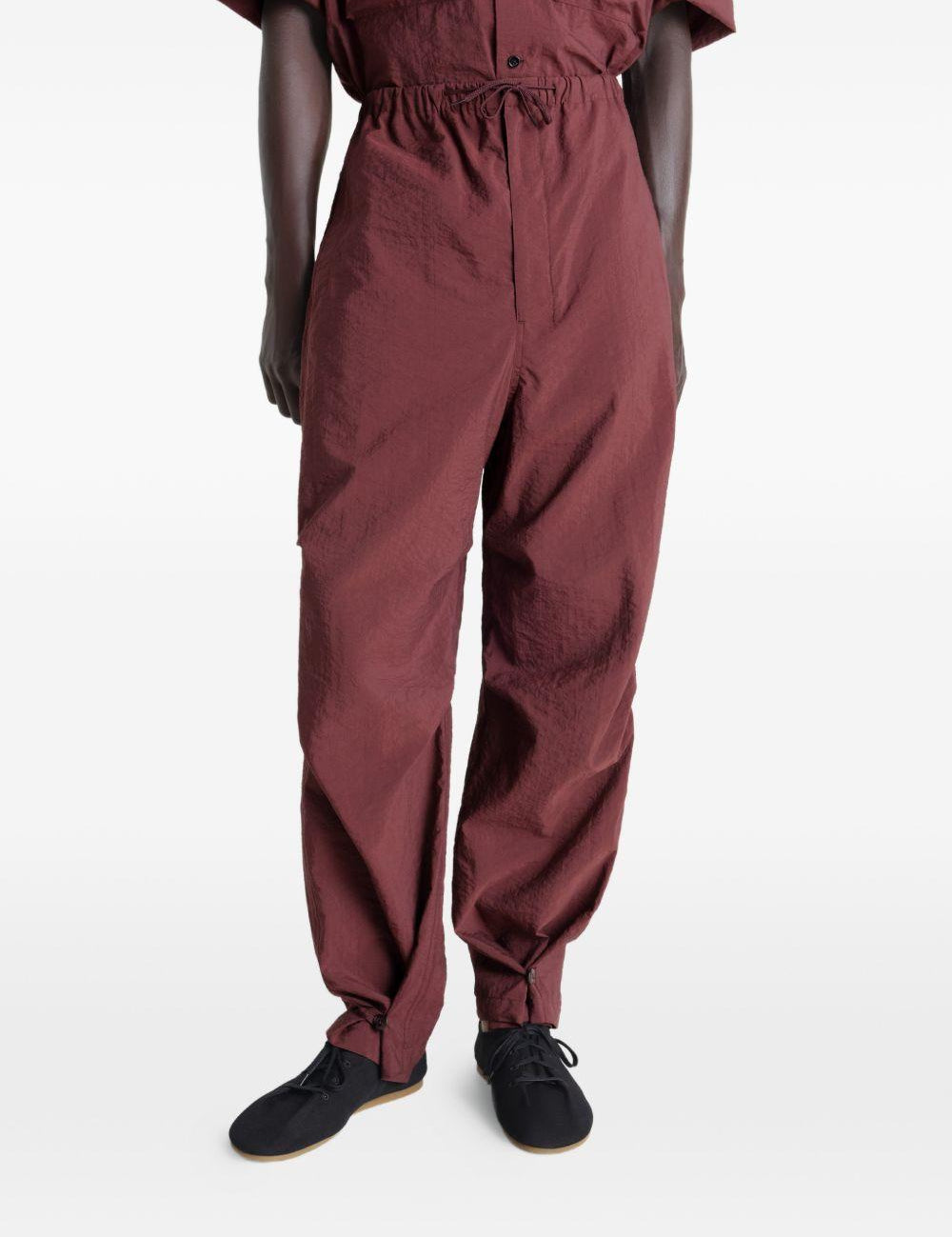 Pantaloni con pieghe in rosso Lemaire - uomo 