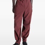 Pantaloni con pieghe in rosso Lemaire - uomo 