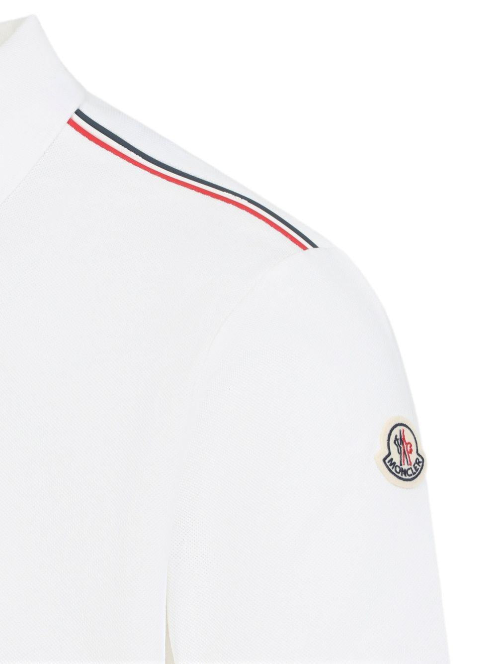 Polo con logo in bianco Moncler - uomo 