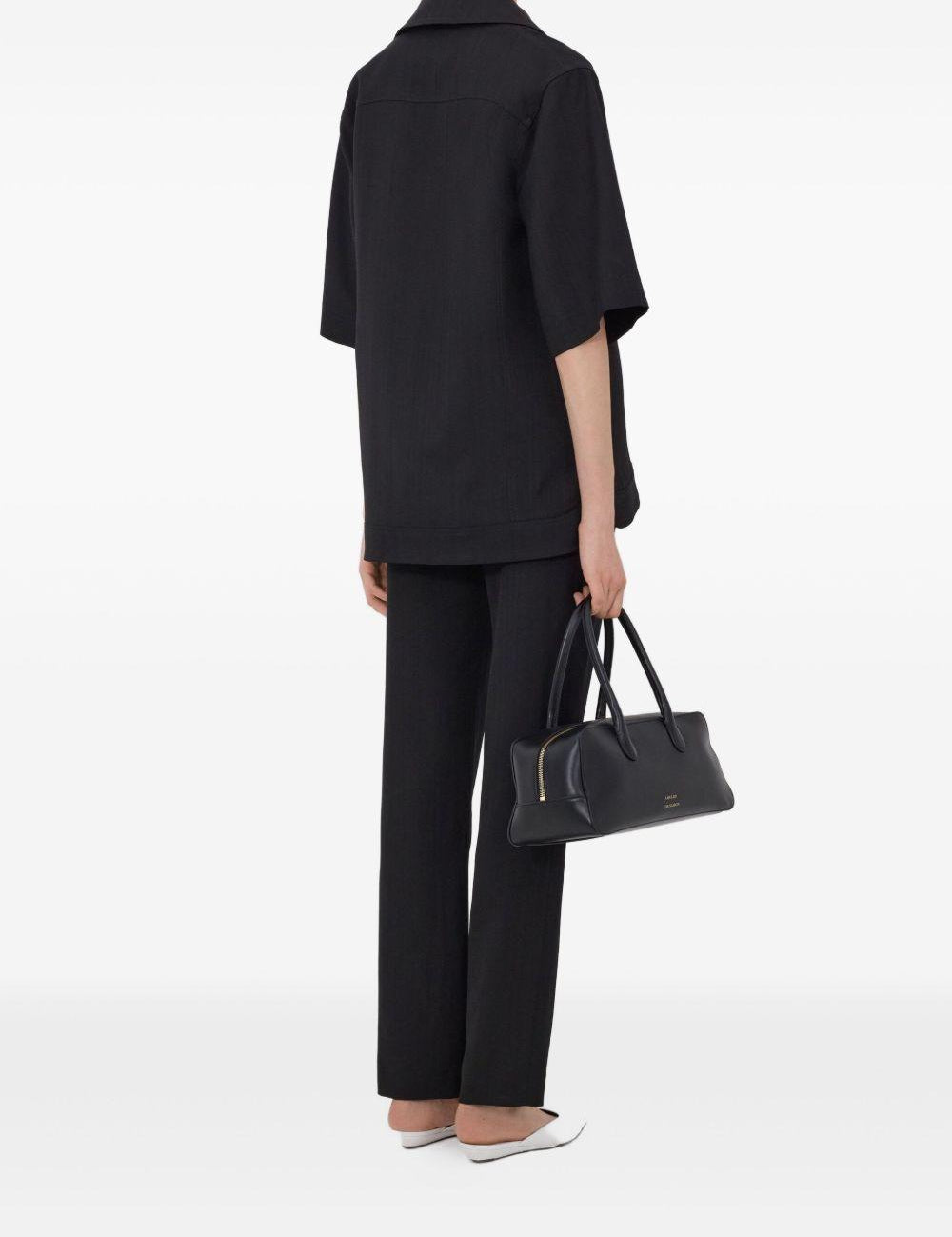 T-shirt con scollo a v ermo in nero Loulou de saison - donna 