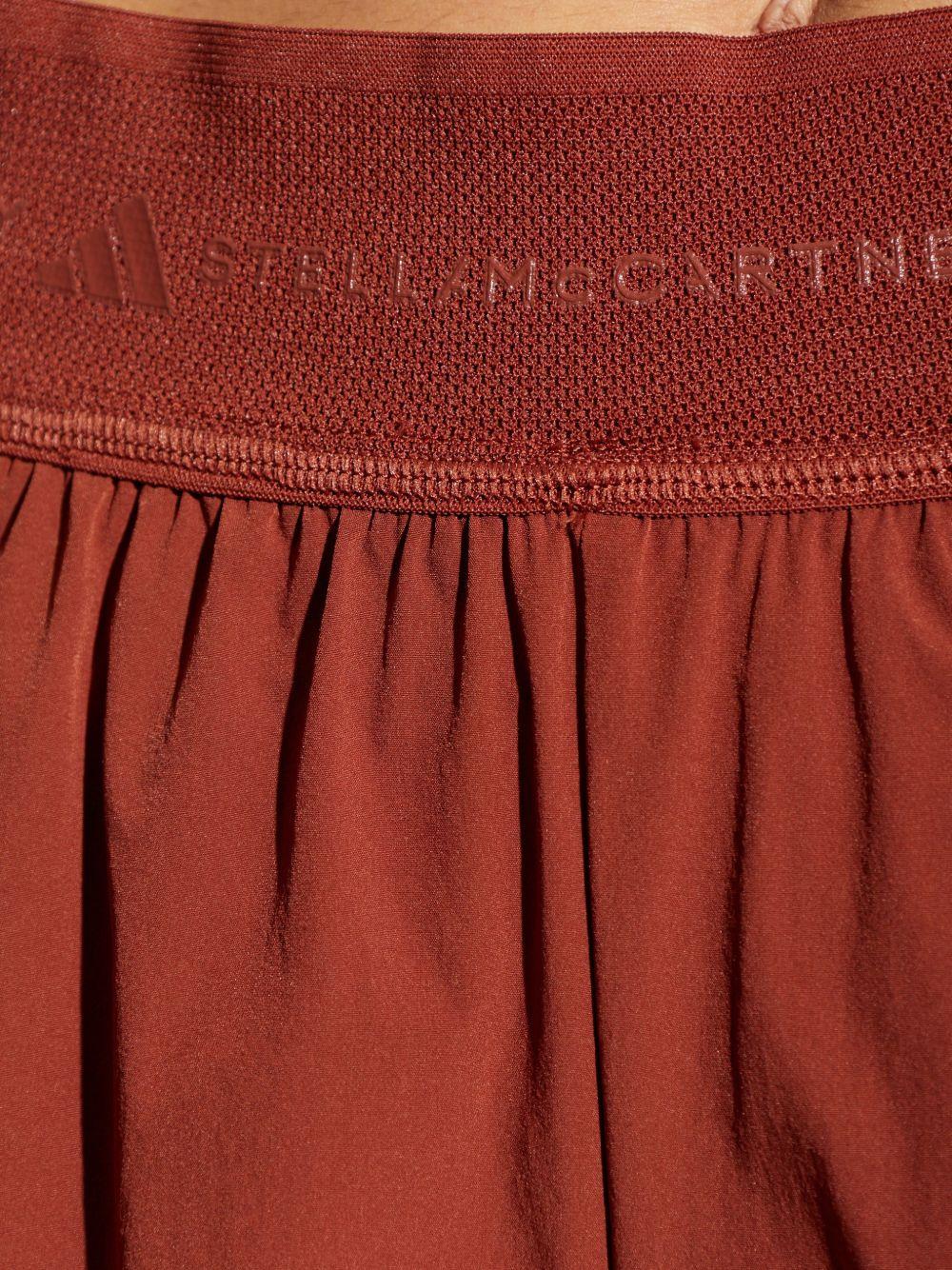 Shorts 2 in 1 con logo in rosso terracotta Adidas by Stella Mc Cartney - donna 