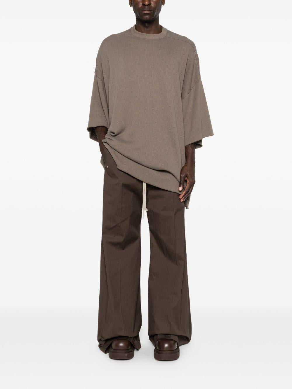 Pantaloni con dettaglio zip in grigio Rick owens - uomo 