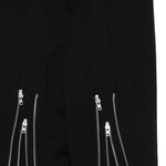 Pantaloni con zip in nero Comme des Garçons Homme Plus - uomo 