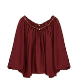 Blusa con decorazioni di perline Aster in bordeaux 