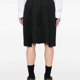Bermuda con bettaglio plissettato in nero Comme Des Garçons Black - unisex 