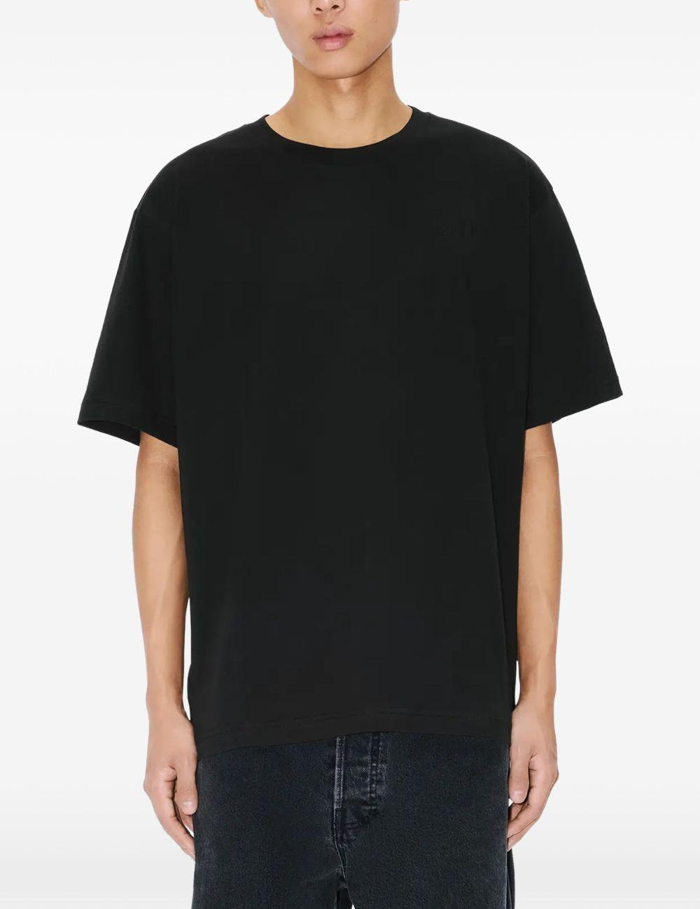 T-shirt con applicazioni di fiori in nero Kenzo - uomo 