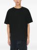 T-shirt con applicazioni di fiori in nero Kenzo - uomo