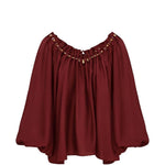 Blusa con decorazioni di perline Aster in bordeaux 