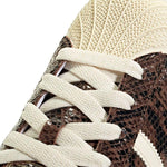 Sneakers superstar stampa animalier in marrone 