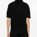 T-shirt polo con logo e toppa in nero Courrèges - donna 