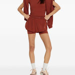 Shorts 2 in 1 con logo in rosso terracotta Adidas by Stella Mc Cartney - donna 