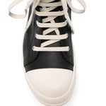 Sneakers alte in pelle in nero 