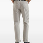 Jeans a cinque tasche con chiusura a bottone in grigio Brunello cucinelli - uomo 