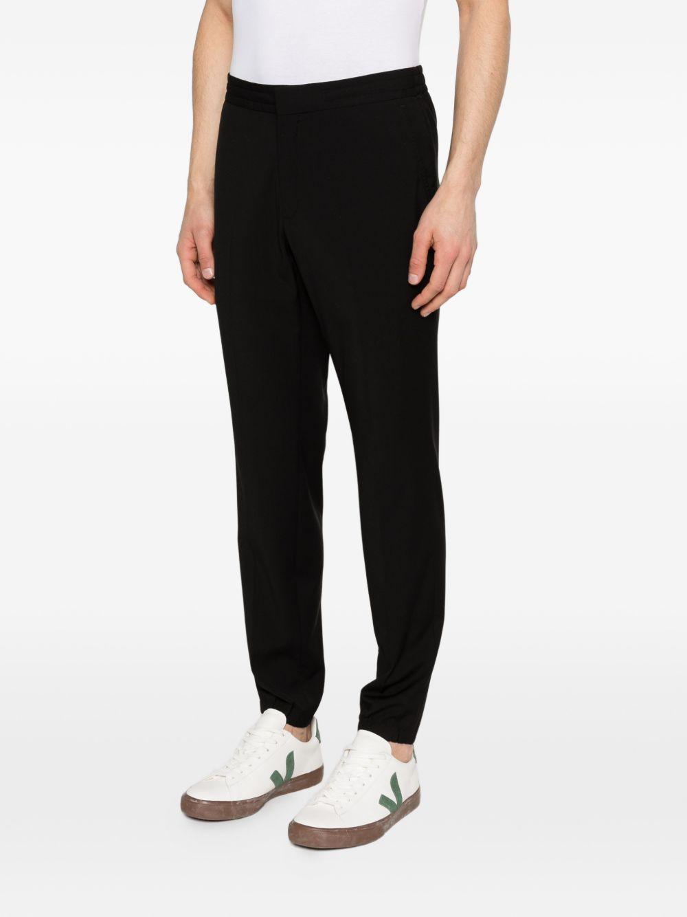 Pantaloni con chiusura nascosta in nero Zegna - uomo 