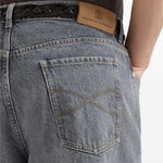 Jeans a cinque tasche in denim grigio con vestibilità iconica. In grigio Brunello cucinelli - uomo 