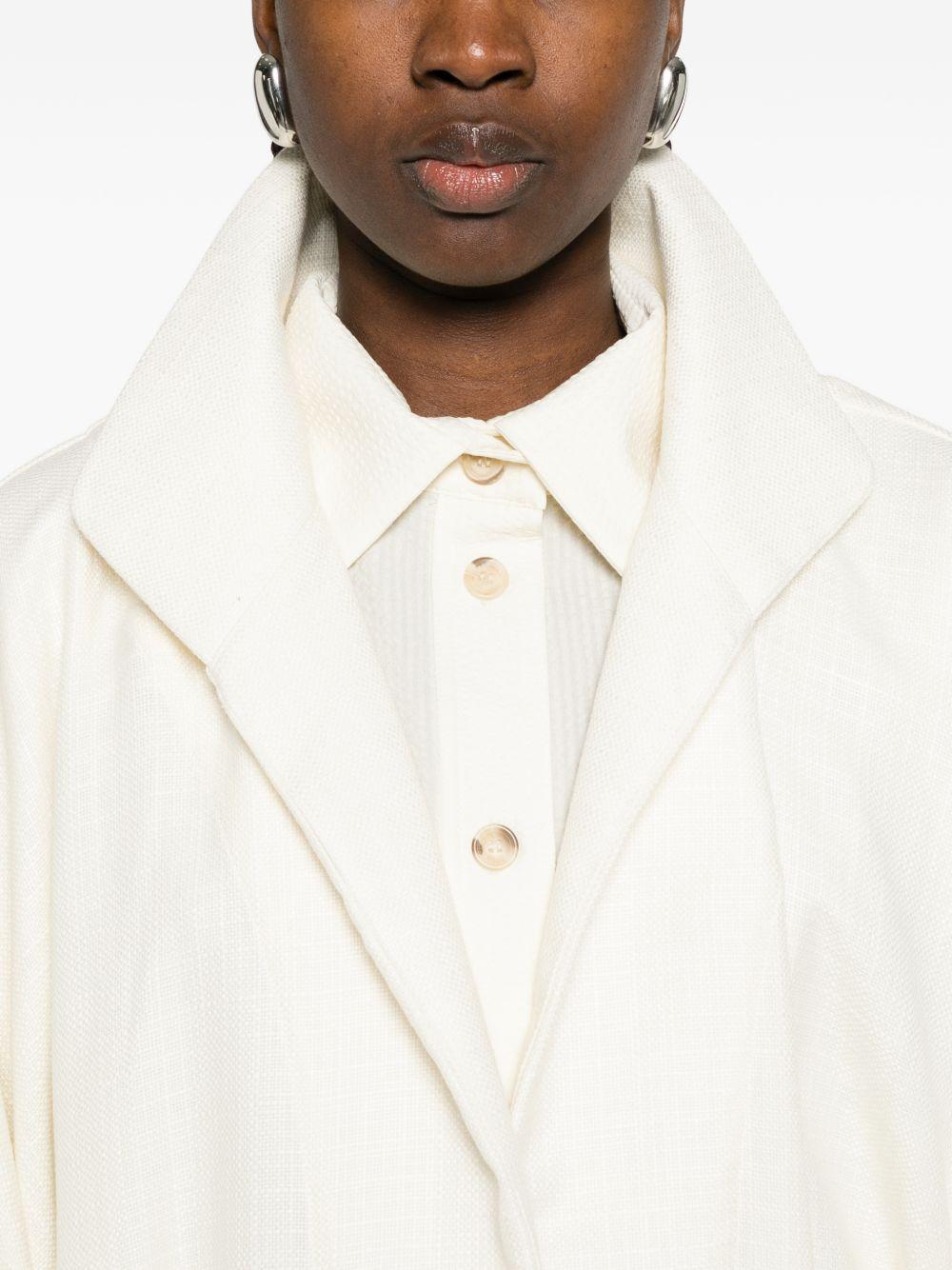 Cappotto con frange e cintura in bianco Batakovic - donna 