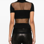 Polo semi trasparente a righe in nero Coperni - donna 
