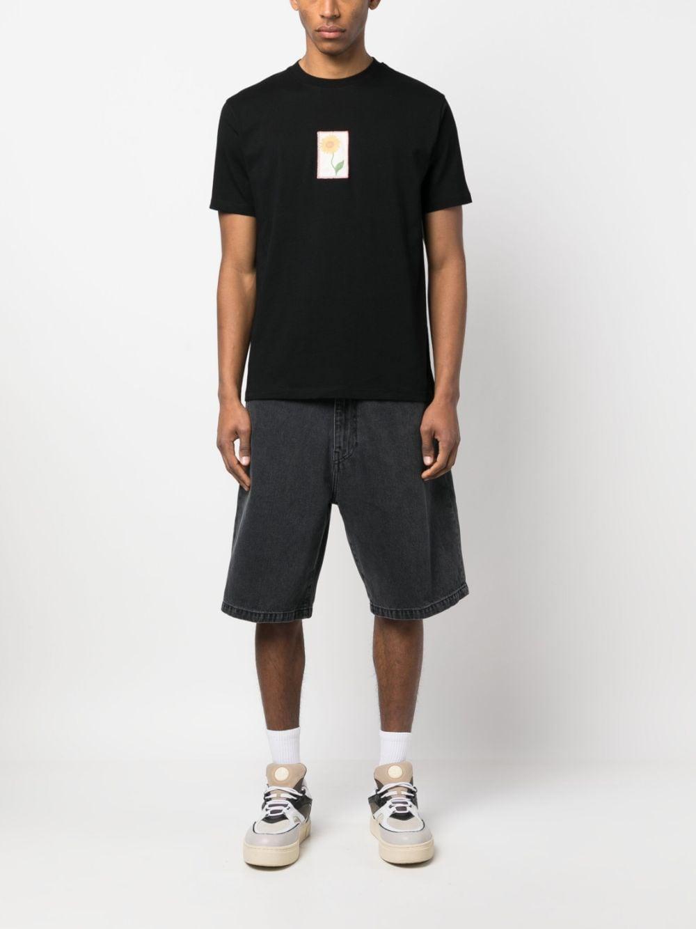 Shorts denim con logo in nero - uomo 