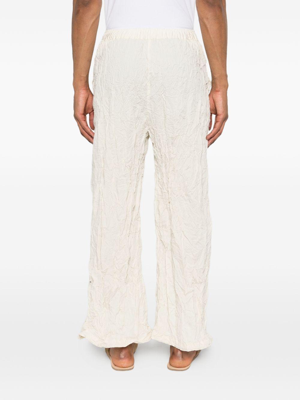 Pantaloni con vita elasticizzata in bianco Gongdid design - uomo 