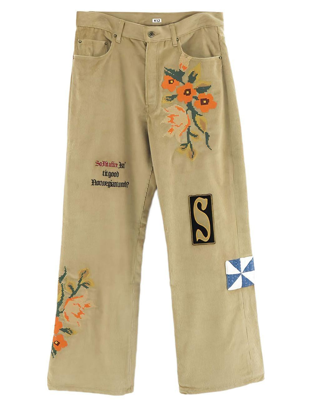 Pantaloni con ricamo floreale in beige Khoki - uomo 