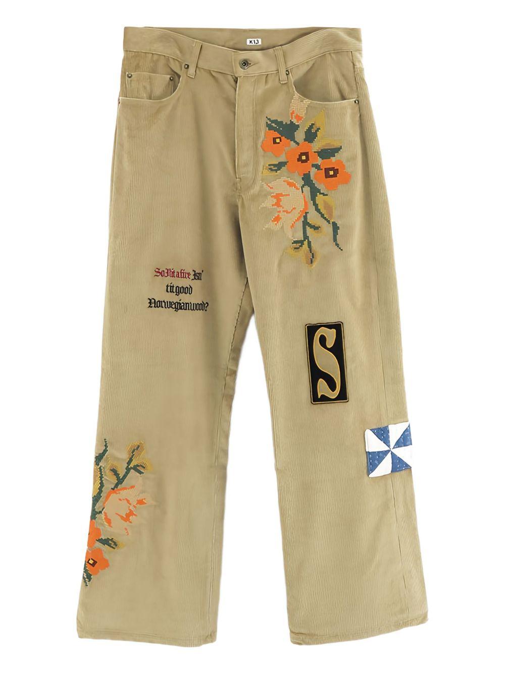 Pantaloni con ricamo floreale in beige Khoki - uomo 
