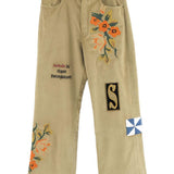 Pantaloni con ricamo floreale in beige Khoki - uomo 