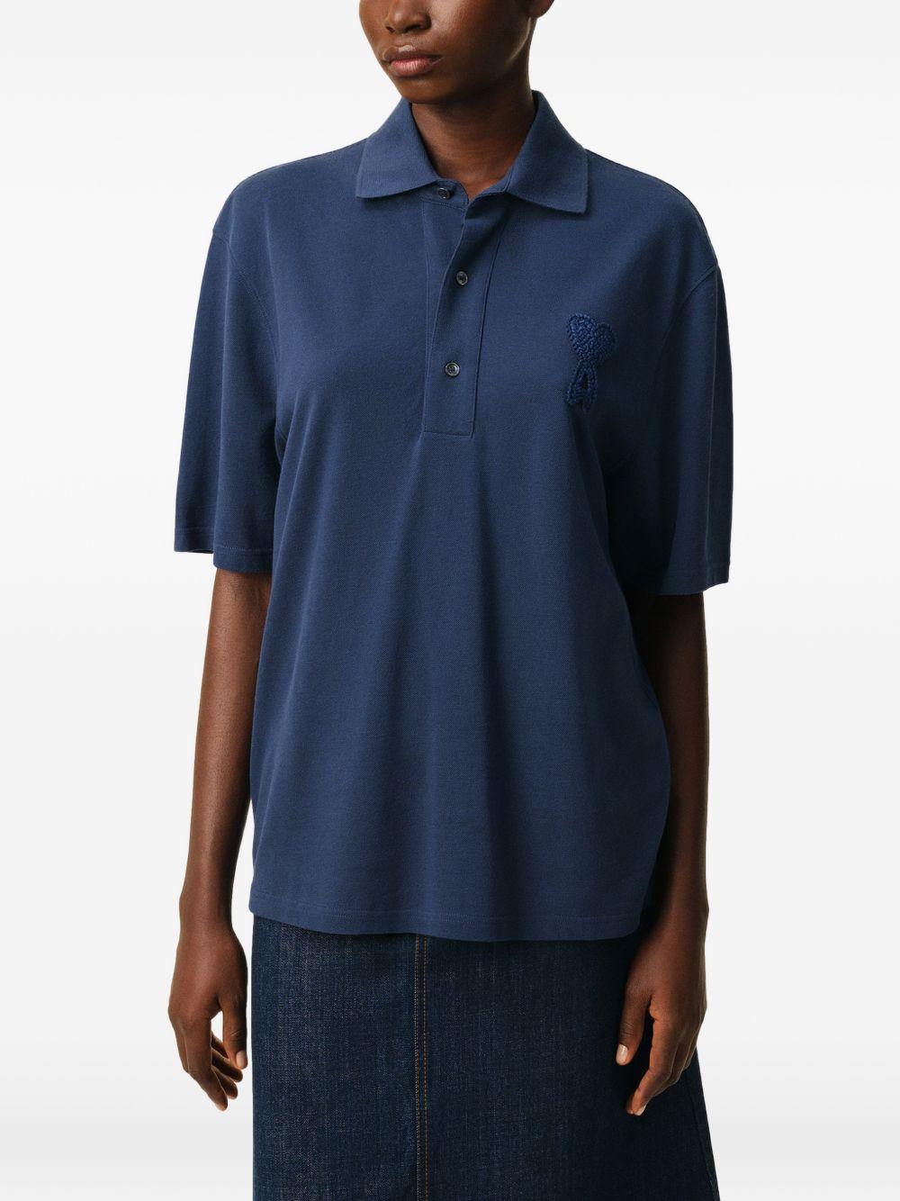Polo Ami de Coeur con applicazione in blu Ami paris - uomo 