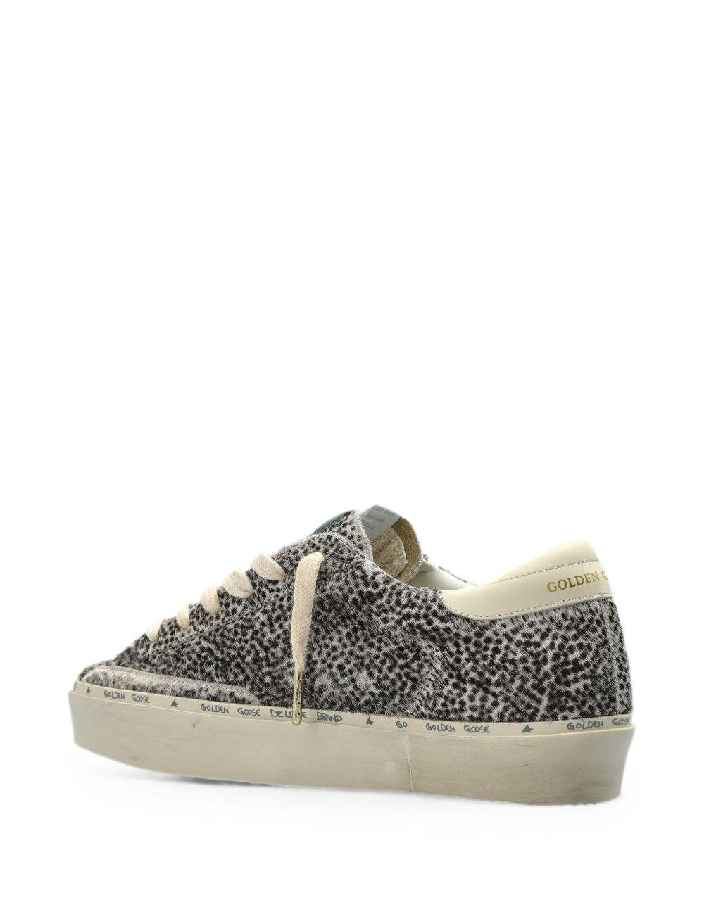 Sneakers hi star in bianco e nero golden goose - donna 
