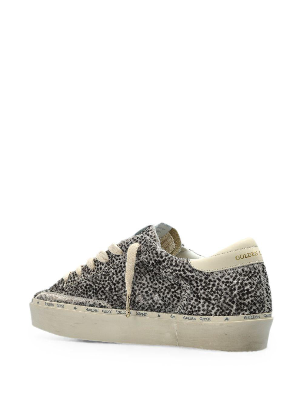 Sneakers hi star in bianco e nero golden goose - donna 