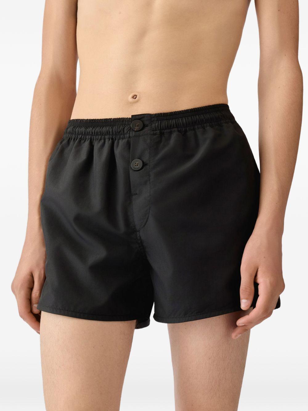 Costume con logo in nero Jacquemus - uomo 