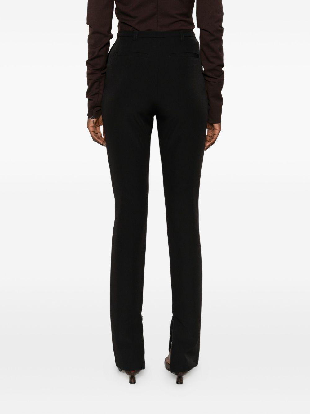 Pantaloni a gamba dritta con spacchi  in nero The latest - donna 
