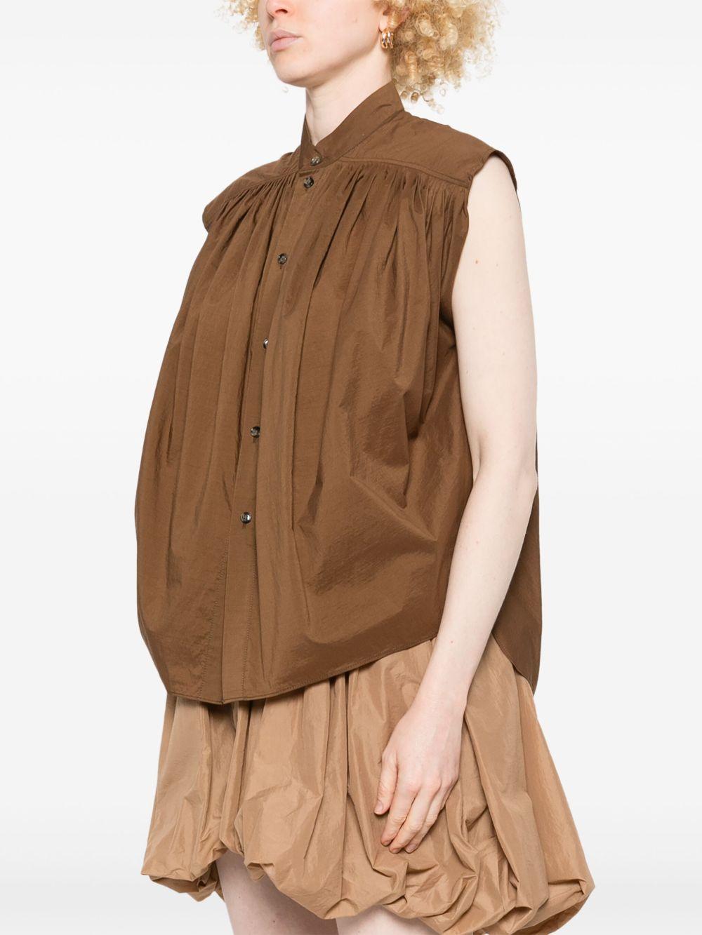 Blusa smanicata in marrone 