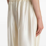 Pantaloni Rohen satinati in avorio Khaite - donna 